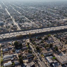 Aerial view of buildings, homes and streets near the Harbor 110 freeway south of downtown Los Angeles in Southern California.
© Trekandphoto / Adobe Stock